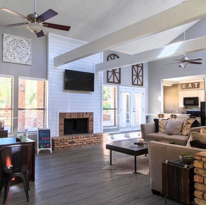 CCV2 clubhouse area with vaulted ceilings and fireplace at country club villas in abilene